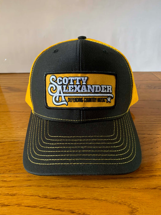Black & Yellow Scotty Alexander "Defending Country Music" Hat